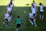 Germany's players warm up during a training session in Lviv